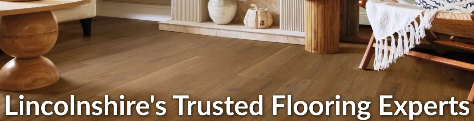 Wood-effect flooring in a contemporary living room from Downtown Stores' carpets and flooring department.