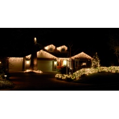 Festive Snowing Icicle Lights 4 Way 11.8m - Warm White
