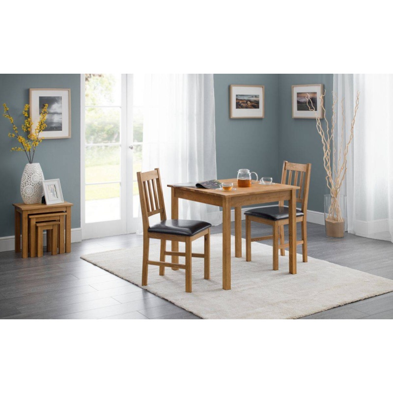 Coxmoor Oak Square Dining Table in room