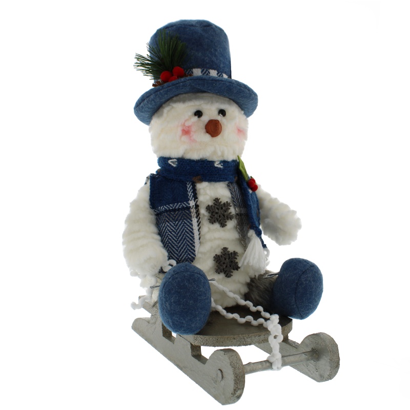 Festive Snowman Sitting On A Sledge Plush - 25cm