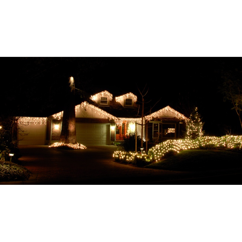 Festive Snowing Icicle Lights 4 Way 5.8m - Warm White