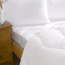 Fine Bedding Co Spundown Mattress Enhancer in use