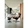 Stressless Rome With Adjustable Headrest Chair and Footstool Urban Cross Base
