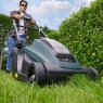 Man Pushing Hayter Hawk 43cm Lawnmower on Grass